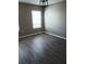 Cozy bedroom with a window that provides natural light at 6339 Magnolia Trails Ln, Gibsonton, FL 33534