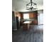 Kitchen featuring an island, modern appliances, and plenty of cabinet space at 6339 Magnolia Trails Ln, Gibsonton, FL 33534