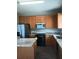 Spacious kitchen features stainless appliances and a center island at 6339 Magnolia Trails Ln, Gibsonton, FL 33534