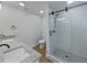 Updated bathroom with granite countertops, double sinks, and a glass-enclosed shower at 3010 Pine Club Dr, Plant City, FL 33566