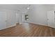 Light and airy bedroom featuring a ceiling fan, a large window, and a closet at 3010 Pine Club Dr, Plant City, FL 33566