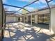 Spacious screened patio offers ample room for entertaining and enjoying outdoor living at 3010 Pine Club Dr, Plant City, FL 33566