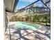Beautiful screened-in pool, perfect for relaxing or entertaining, with plenty of sunlight and mature landscaping at 3010 Pine Club Dr, Plant City, FL 33566