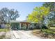 Charming single-story home with a covered carport and stone accents at 3962 Poinsettia Dr, St Pete Beach, FL 33706