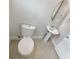 Small bathroom with a modern pedestal sink and toilet over tile floor at 5954 Caldera Ridge Dr, Lithia, FL 33547