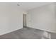 Bright bedroom offers plush carpet, a walk-in closet, and neutral paint, creating a serene atmosphere at 5954 Caldera Ridge Dr, Lithia, FL 33547