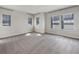 Bedroom with carpet, neutral walls, and multiple windows providing ample natural light at 5954 Caldera Ridge Dr, Lithia, FL 33547