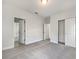 Bright bedroom featuring neutral walls, carpet, and closet with sliding doors at 5954 Caldera Ridge Dr, Lithia, FL 33547