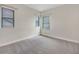 Inviting bedroom with natural light and neutral carpet provides a tranquil and inviting space at 5954 Caldera Ridge Dr, Lithia, FL 33547
