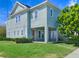 Charming two-story home with a well-manicured lawn and covered carport at 5954 Caldera Ridge Dr, Lithia, FL 33547