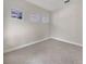 Spacious bonus room has neutral paint, base trim, three windows, and tile flooring at 5954 Caldera Ridge Dr, Lithia, FL 33547