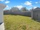 Expansive fenced backyard featuring a storage shed and lush greenery, perfect for outdoor activities and relaxation at 8340 75Th Pl, Seminole, FL 33777