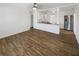 Spacious living area with wood-look tile flooring and ample natural light at 8340 75Th Pl, Seminole, FL 33777