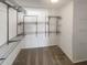 Organized walk-in closet featuring metal shelving for optimal storage at 8340 75Th Pl, Seminole, FL 33777
