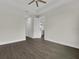Spacious bedroom features hardwood floors, neutral paint, and closet at 15741 Autry Cir, Port Charlotte, FL 33981