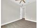 An interior shot showcases a bedroom with wood floors and a doorway at 15741 Autry Cir, Port Charlotte, FL 33981