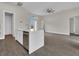 Kitchen island featuring stainless steel dishwasher and sink with modern fixtures at 15741 Autry Cir, Port Charlotte, FL 33981