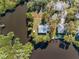 Waterfront home situated on private parcel surrounded by mature trees and bay views at 5275 Miller Bayou Dr, Port Richey, FL 34668