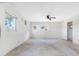 Spacious bedroom featuring multiple windows and a ceiling fan at 5275 Miller Bayou Dr, Port Richey, FL 34668