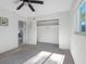 Bedroom with closet and a window bringing in natural light at 5275 Miller Bayou Dr, Port Richey, FL 34668