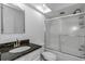Bathroom features include a black granite sink and glass shower at 13794 Marseilles Ct, Clearwater, FL 33762