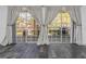 Large sliding glass doors open to the outdoor patio with backyard view at 13794 Marseilles Ct, Clearwater, FL 33762