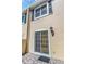 Patio with sliding glass door and gray brick floor at 13794 Marseilles Ct, Clearwater, FL 33762
