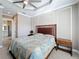 Tastefully decorated bedroom with a ceiling fan, neutral paint, and bright natural light at 4949 Sandy Glen Way, Wimauma, FL 33598