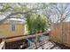 Second story balcony overlooks the backyard with mature trees offering plenty of shade at 3304 W Granada St # A, Tampa, FL 33629