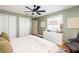 This bedroom includes two closets, natural light, and neutral paint at 3304 W Granada St # A, Tampa, FL 33629