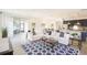 Bright living room with patio access, stylish decor and an open floorplan at 150 Castile Ct, Punta Gorda, FL 33983
