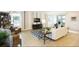 Cozy and stylish living room with large windows and comfortable seating at 150 Castile Ct, Punta Gorda, FL 33983