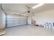 Spacious two-car garage with epoxy flooring and ample storage space at 5013 Sea Branch Ave, Apollo Beach, FL 33572