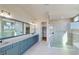 Modern main bathroom featuring double vanities and a glass-enclosed shower at 5013 Sea Branch Ave, Apollo Beach, FL 33572