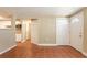 The bonus room overlooks the kitchen with tile floors, tan walls, closet, and entry door at 3201 Cord St, Tampa, FL 33605