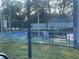 Community tennis court available for residents to enjoy a game of tennis at 9444 Tradewinds Ave, Seminole, FL 33776