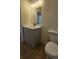 Cozy bathroom featuring modern fixtures, and a single sink vanity at 17065 Malta Ave Ave, Port Charlotte, FL 33954