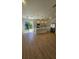 Modern, open kitchen with an island, stainless steel appliances, and lots of natural light at 17065 Malta Ave Ave, Port Charlotte, FL 33954