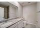 Bathroom with dual sinks, toilet, and tiled shower boasts contemporary design for comfort and functionality at 2258 Sulstone Dr, Punta Gorda, FL 33983