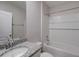 Bathroom features shower-tub combo, granite vanity and fixtures providing a clean, convenient space at 2258 Sulstone Dr, Punta Gorda, FL 33983