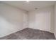Bedroom features neutral walls, cozy carpeting, and large closet offering a versatile and comfortable retreat at 2258 Sulstone Dr, Punta Gorda, FL 33983