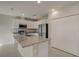 Bright kitchen with white cabinets, stainless steel appliances, and granite countertops at 2258 Sulstone Dr, Punta Gorda, FL 33983