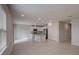Bright, open-concept kitchen with an island, stainless steel appliances, and tile flooring at 2258 Sulstone Dr, Punta Gorda, FL 33983