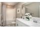 This bathroom features a dual sink vanity with a combined shower and tub at 2349 Broadpoint Dr, Punta Gorda, FL 33983