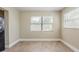 Dining area featuring wood-look flooring and large bright windows at 2500 Erie S St, St Petersburg, FL 33712