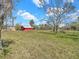 A spacious barn on a sprawling property, ideal for storage, livestock, or hobbies at 8123 Double Branch Rd # 1, Tampa, FL 33635