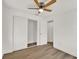 Bedroom featuring wood floors, closet space, and freshly painted walls at 8123 Double Branch Rd # 1, Tampa, FL 33635