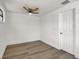 Bedroom featuring wood floors, ceiling fan, and freshly painted walls at 8123 Double Branch Rd # 1, Tampa, FL 33635