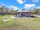 Cozy home with a covered patio, offering a relaxed outdoor living space and a convenient laundry area at 8123 Double Branch Rd # 1, Tampa, FL 33635