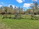 Fenced grassy yard, safe and spacious for outdoor enjoyment and pets at 8123 Double Branch Rd # 1, Tampa, FL 33635